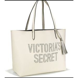 📌SOLD📌VS white perforated logo tote with tassel